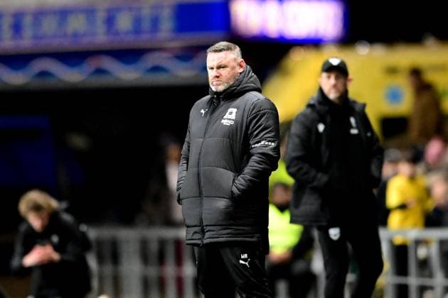 Oxford United v Plymouth Argyle EFL Sky Bet Championship 29 12 2024. Plymouth Argyle manager Wayne Rooney with Oxford United manager Gary Rowett in the background during the EFL Sky Bet Championship match between Oxford United and Plymouth Argyle at the Kassam Stadium, Oxford, England on 29 December 2024. Oxford Kassam Stadium Oxfordshire England Editorial use only DataCo restrictions apply See www.football-dataco.com , Copyright: xDennisxGoodwinx PSI-21148-0047