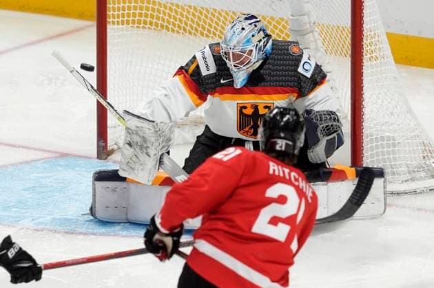 December 29, 2024, Ottawa, On, Canada: Canada forward Calum Ritchie (21) fires the puck wide past Germany goaltender Nico Pertuch during first period IIHF World Junior Hockey Championship tournament action in Ottawa, Sunday, Dec. 29, 2024. Calum Ritchie Nico Pertuch  - ZUMAc35_ 20241229_zaf_c35_073 Copyright: xAdrianxWyldx