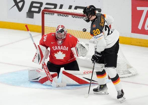 December 29, 2024, Ottawa, On, Canada: Germany forward Maxim Schafer watches the puck pass Canada goaltender Carter George and go over the net during second period IIHF World Junior Hockey Championship tournament action in Ottawa, Sunday, Dec. 29, 2024. Maxim Schafer Carter George  - ZUMAc35_ 20241229_zaf_c35_088 Copyright: xAdrianxWyldx