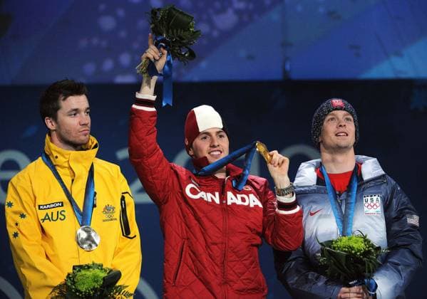 Medals Canada s Alexandre Bilodeau, middle, celebrates after receiving the Olympic gold medal in the Freestyle Skiing-Men s Moguls event at the 2010 Winter Olympic Games, Olympische Spiele, Olympia, OS in Vancouver, Canada, Monday, February 15, 2010. Bilodeau finished ahead of Australia s silver medalist Dale Begg-Smith, left, and American bronze medalist Bryon Wilson. (Larry Wong Canwest News Service MCT) Vancouver CA CAN EDITORIAL USE ONLY Copyright: xx 1084606 LarryxWongx krtphotoslive398372