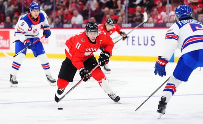 December 31, 2024, Ottawa, On, Canada: Canada s Brayden Yager (11) skates with the puck as USA s Drew Fortescue (5) defends during second period IIHF World Junior Hockey Championship tournament action in Ottawa on Tuesday, Dec. 31, 2024. Canada News - December 31, 2024  - ZUMAc35_ 20241231_zaf_c35_015 Copyright: xSeanxKilpatrickx