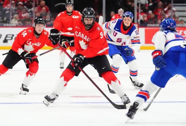 December 31, 2024, Ottawa, On, Canada: Canada s Gavin McKenna (9) skates with the puck as USA s Drew Fortescue (5) defends during second period IIHF World Junior Hockey Championship tournament action in Ottawa on Tuesday, Dec. 31, 2024. Canada News - December 31, 2024  - ZUMAc35_ 20241231_zaf_c35_025 Copyright: xSeanxKilpatrickx