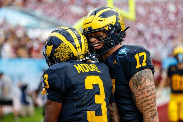 December 31, 2024, Tampa, Florida, USA: Michigan Wolverines wide receiver Fredrick Moore (3) celebrates with Michigan Wolverines tight end Marlin Klein (17), after he scores a touchdown against the Alabama Crimson Tide during the first quarter at Raymond James Stadium in Tampa on Tuesday, Dec. 31, 2024. Tampa USA - ZUMAs70_ 0790277448st Copyright: xJeffereexWoox