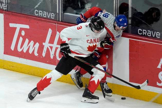 January 2, 2025, Ottawa, On, CANADA: Canada defenceman Sam Dickinson (3) collides with Czechia forward Matej Mastalirsky (18) during second period IIHF World Junior Hockey Championship quarterfinal action in Ottawa, Thursday, Jan. 2, 2025. Matej Mastalirsky Sam Dickinson  - ZUMAc35_ 20250102_zaf_c35_067 Copyright: xAdrianxWyldx