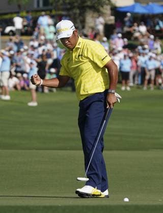 Golf: The Sentry Japan s Hideki Matsuyama celebrates after making a birdie on the 18th hole during the final round of The Sentry golf tournament at the Plantation Course in Kapalua on the Hawaiian island of Maui on Jan. 5, 2025.  A14AA0003943082P