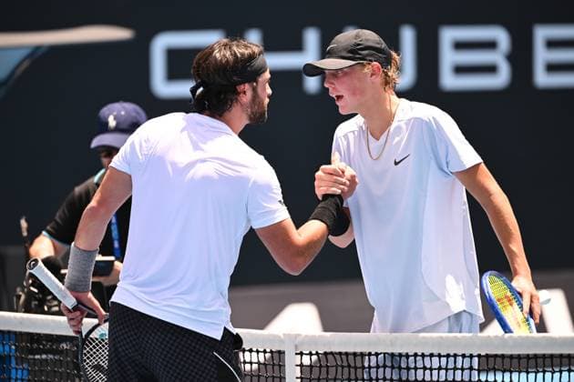TENNIS AUSTRALIAN OPEN QUALIFYING, Cruz Hewitt of Australia (right) after his loss with Nikoloz Basilashvili of Georgia in their during their mens qualifying singles match between Cruz Hewitt of Australia and Nikoloz Basilashvili of Georgia for the Australian Open tennis tournament at Melbourne Park in Melbourne, Tuesday, January 7, 2025. ( NO ARCHIVING, EDITORIAL USE ONLY, NO USE IN BOOKS WITHOUT CONSENT MELBOURNE VICTORIA AUSTRALIA  Copyright: xJAMESxROSSx 20250107175172083530