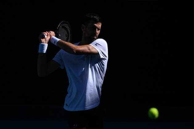 TENNIS AO CHARITY SINNER POPYRIN, Novak Djokovic of Serbia in action during a training session at the Australian Open tennis tournament at Melbourne Park in Melbourne, Tuesday, January 7, 2025. ( NO ARCHIVING, EDITORIAL USE ONLY, NO USE IN BOOKS WITHOUT CONSENT MELBOURNE VICTORIA AUSTRALIA  Copyright: xJAMESxROSSx 20250107124198125990