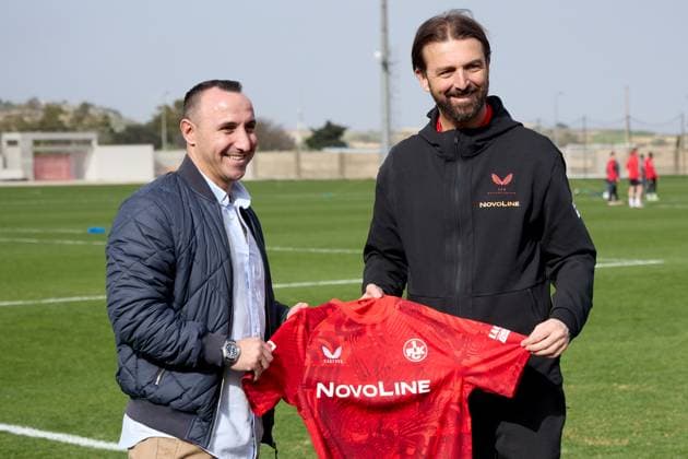 TRAINING GROUNDS, TA™ QALI, MALTA: JANUARY 7, 2025 Maltese former 1. FC Kaiserslautern soccer player Michael Mifsud (left) receives a club jersey memento from Thomas Hengen (right), club managing director, prior to a 1. FC Kaiserslautern training event at the Training Grounds, Ta™ Qali, Malta on January 7, 2025. The 2. Bundesliga German team is undergoing a week winter training camp in Malta as from January 3, 2025. 1. FC Kaiserslautern winter training camp in Malta 2025. MLT_FCK_2025