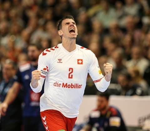 Photo Andy SCHMID Switzerland celebrating a goal , Suisse Handball European Championship, preliminary round in Berlin , on Sun 14 01 2024 Switzerland France 26 26