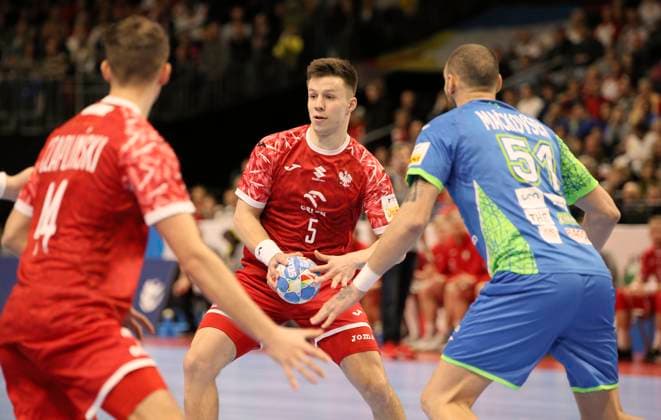 Photo on the ball Michal Olejniczak Poland against Borut Mackovsek Slovenia , right European Handball Championship, preliminary round in Berlin , Poland Slovenia on Sat 13 01 2024