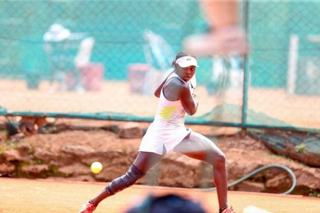 RECORD DATE NOT STATED NAIROBI, KENYA - JANUARY 9: Kenya, Angella Okutoyi plays a backhand shot to Yufei Ren of China during W35 International Tennis Federation (ITF) World Tennis tour championship on January 9th 2025 played at Nairobi Club, Okutoyi won 6-2, Yufei Retired 4-4.Photo CHRIS OMOLLO Copyright: xx