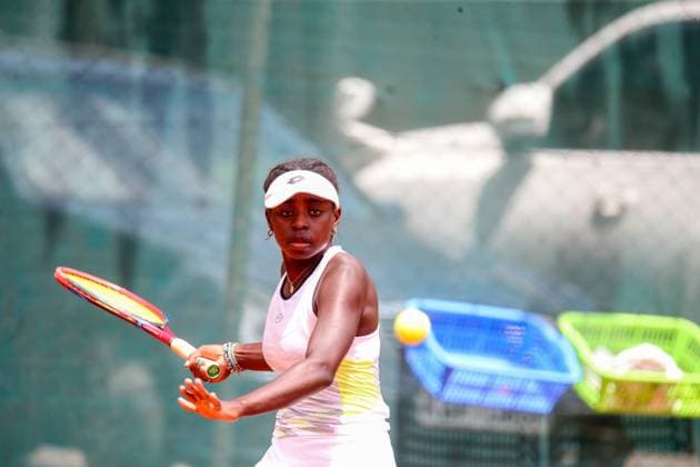 RECORD DATE NOT STATED NAIROBI, KENYA - JANUARY 9: Kenya, Angella Okutoyi plays a forehand shot to Yufei Ren of China during W35 International Tennis Federation (ITF) World Tennis tour championship on January 9th 2025 played at Nairobi Club, Okutoyi won 6-2, Yufei Retired 4-4.Photo CHRIS OMOLLO Copyright: xx