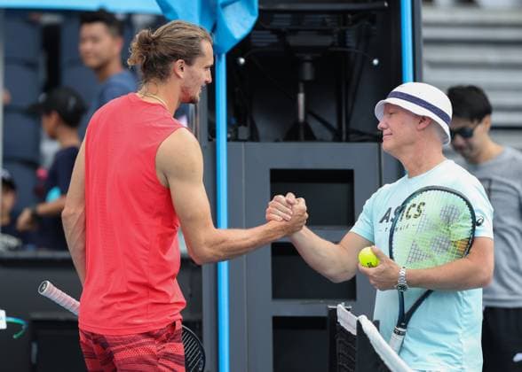 Alexander Zverev greets Kei Nishikori coach Thomas Johansson, training, Australian Open 2024, Melbourne Park, Melbourne, Victoria, Australia Copyright: xJuergenxHasenkopfx