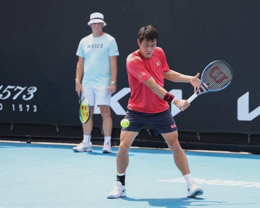 Kei Nishikori and trainer, coach Thomas Johansson out of focus, training, Australian Open 2024, Melbourne Park, Melbourne, Victoria, Australia Copyright: xJuergenxHasenkopfx