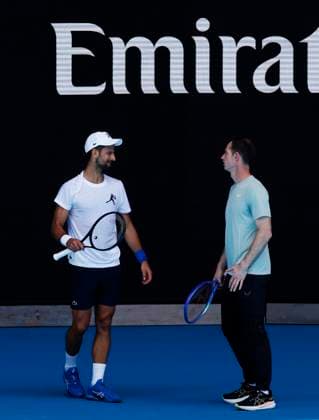 (250111) -- MELBOURNE, Jan. 11, 2025 -- Novak Djokovic (L) of Serbia and his coach Andy Murray attend a training session during the Australian Open tennis tournament in Melbourne, Australia, Jan. 11, 2025. ) (SP)AUSTRALIA-MELBOURNE-TENNIS-AUSTRALIAN OPEN-TRAINING MaxPing 