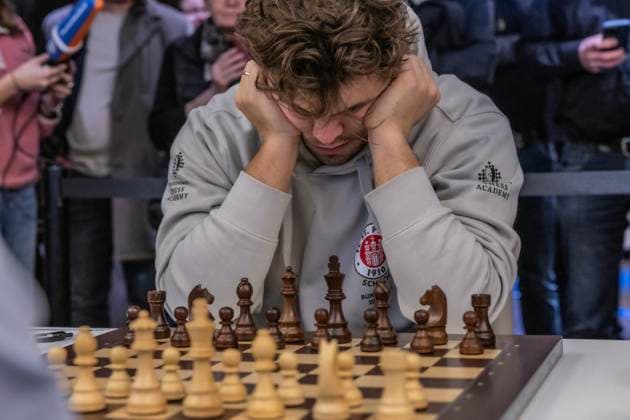 Chess World Champion Magnus Carlson Chess World Champion Magnus Carlson plays for the chess section of FC St Pauli Â
