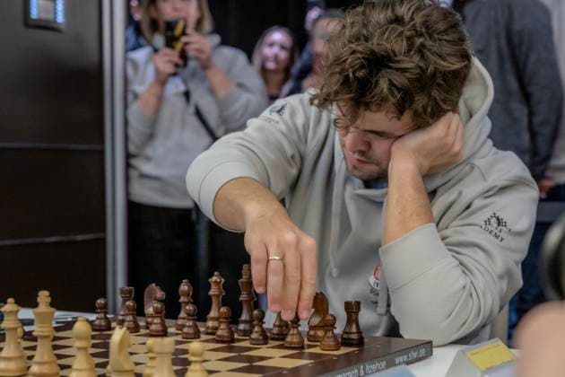 Chess World Champion Magnus Carlson Chess World Champion Magnus Carlson plays for the chess section of FC St Pauli Â