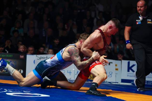 Semifinal Wrestling Bundesliga ASV Schorndorf vs SV Wacker Burghausen 98kg Greek Roman Lucas Alexandros Lazogianis ASV Schorndorf in red vs Felix Baldauf SV Wacker Burghausen in blue during the semifinal match of the German Team Championship between ASV Schorndorf and SV Wacker Burghausen in the Birtat Wrestling Bundesliga on 01 01 2025 in Schorndorf, Germany