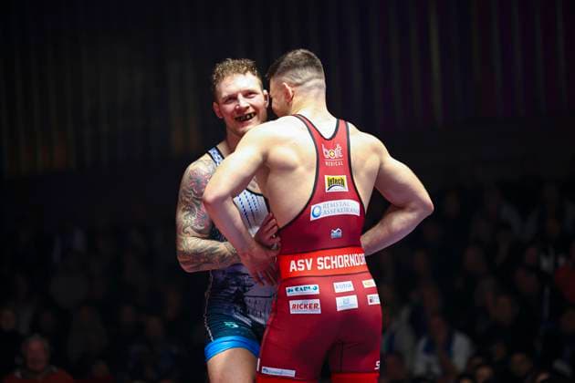 Semifinal Wrestling Bundesliga ASV Schorndorf vs SV Wacker Burghausen 98kg Greek Roman Lucas Alexandros Lazogianis ASV Schorndorf in red vs Felix Baldauf SV Wacker Burghausen in blue during the semifinal match of the German Team Championship between ASV Schorndorf and SV Wacker Burghausen in the Birtat Wrestling Bundesliga on 01 01 2025 in Schorndorf, Germany