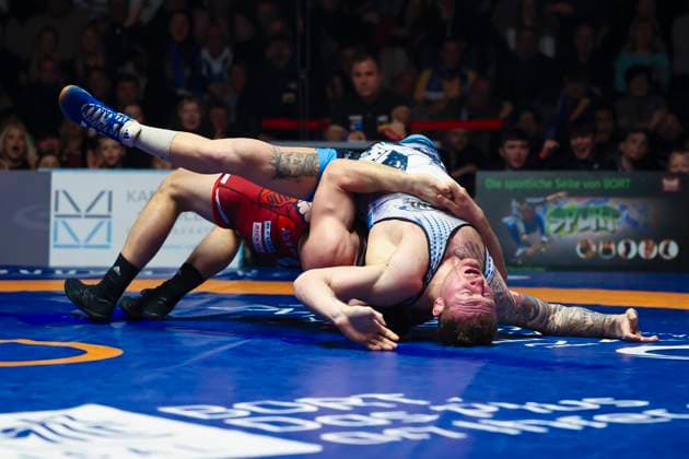 Semifinal Wrestling Bundesliga ASV Schorndorf vs SV Wacker Burghausen 98kg Greek Roman Lucas Alexandros Lazogianis ASV Schorndorf in red vs Felix Baldauf SV Wacker Burghausen in blue during the semifinal match of the German Team Championship between ASV Schorndorf and SV Wacker Burghausen in the Birtat Wrestling Bundesliga on 01 01 2025 in Schorndorf, Germany