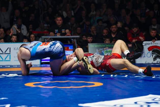 Semifinal Wrestling Bundesliga ASV Schorndorf vs SV Wacker Burghausen 86kg freestyle Arseni Dzhioev ASV Schorndorf in red vs Eduard Tatarinov SV Wacker Burghausen in blue during the semifinal match of the German Team Championship between ASV Schorndorf and SV Wacker Burghausen in the Birtat Wrestling Bundesliga on 01 01 2025 in Schorndorf, Germany