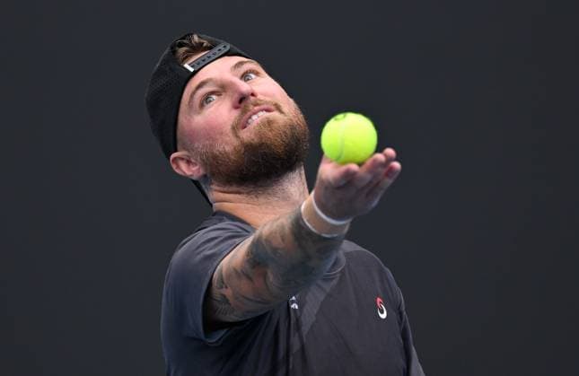 TENNIS AUSTRALIAN OPEN, Omar Jasika of Australia prepares to serve during his round 1 match against Hugo Gaston of France during the 2025 Australian Open at Melbourne Park in Melbourne, Sunday, January 12, 2025. ( NO ARCHIVING, EDITORIAL USE ONLY, NO USE IN BOOKS WITHOUT CONSENT MELBOURNE VICTORIA AUSTRALIA  Copyright: xJAMESxROSSx 20250112135109173955