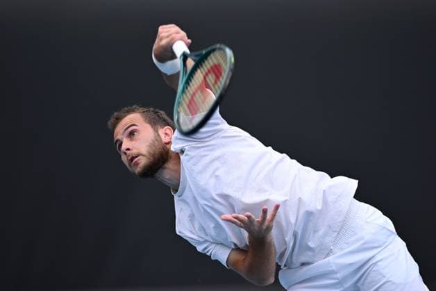 TENNIS AUSTRALIAN OPEN, Hugo Gaston of France serves during his round 1 match against Omar Jasika of Australia during the 2025 Australian Open at Melbourne Park in Melbourne, Sunday, January 12, 2025. ( NO ARCHIVING, EDITORIAL USE ONLY, NO USE IN BOOKS WITHOUT CONSENT MELBOURNE VICTORIA AUSTRALIA  Copyright: xJAMESxROSSx 20250112135826988945