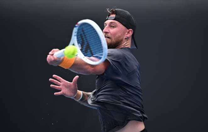 TENNIS AUSTRALIAN OPEN, Omar Jasika of Australia returns during his round 1 match against Hugo Gaston of France during the 2025 Australian Open at Melbourne Park in Melbourne, Sunday, January 12, 2025. ( NO ARCHIVING, EDITORIAL USE ONLY, NO USE IN BOOKS WITHOUT CONSENT MELBOURNE VICTORIA AUSTRALIA  Copyright: xJAMESxROSSx 20250112129144453247