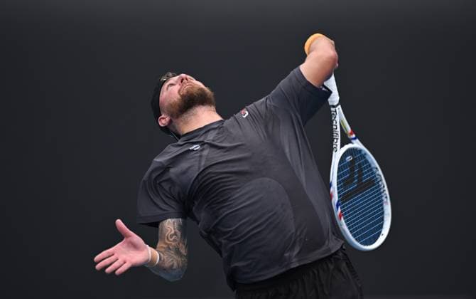 TENNIS AUSTRALIAN OPEN, Omar Jasika of Australia prepares to serve during his round 1 match against Hugo Gaston of France during the 2025 Australian Open at Melbourne Park in Melbourne, Sunday, January 12, 2025. ( NO ARCHIVING, EDITORIAL USE ONLY, NO USE IN BOOKS WITHOUT CONSENT MELBOURNE VICTORIA AUSTRALIA  Copyright: xJAMESxROSSx 20250112177174489592