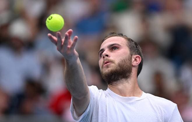 TENNIS AUSTRALIAN OPEN, Hugo Gaston of France prepares to serve during his round 1 match against Omar Jasika of Australia during the 2025 Australian Open at Melbourne Park in Melbourne, Sunday, January 12, 2025. ( NO ARCHIVING, EDITORIAL USE ONLY, NO USE IN BOOKS WITHOUT CONSENT MELBOURNE VICTORIA AUSTRALIA  Copyright: xJAMESxROSSx 20250112151343403516