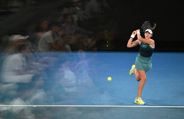 TENNIS AUSTRALIAN OPEN, Mirra Andreeva of Russia returns during her round 1 match against Marie Bouzkova of Czech Republic during the 2025 Australian Open at Melbourne Park in Melbourne, Sunday, January 12, 2025. ( NO ARCHIVING, EDITORIAL USE ONLY, NO USE IN BOOKS WITHOUT CONSENT MELBOURNE VICTORIA AUSTRALIA  Copyright: xLUKASxCOCHx 20250112130992535752