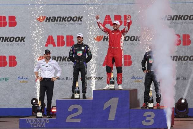 Tommaso Volpe ITA Head of Nissan Motorsport, runner-up Antonio Felix da Costa POR Porsche, winner Oliver Rowland GBR Nissan and Pascal Wehrlein GER Porsche hidden on the podium, FIA Formula E World Championship Season 11, Mexico City E Prix, 11 01 2025, Mexico