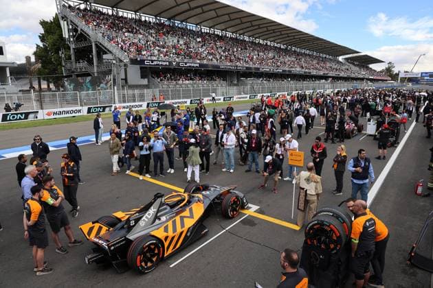 Colorful hustle and bustle on the starting grid for the race, Sam Bird McLaren Gen3 Evo racing car in the foreground, FIA Formula E World Championship Season 11, Mexico City E Prix, 11 01 2025, Mexico