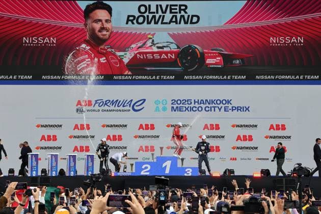 Runner-up Antonio Felix da Costa POR Porsche, winner Oliver Rowland GBR Nissan and Pascal Wehrlein GER Porsche at the champagne shower under a huge video wall with the winner on it, FIA Formula E World Championship Season 11, Mexico City E Prix, 11 01 2025, Mexico