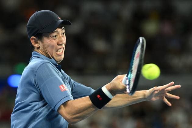TENNIS AUSTRALIAN OPEN, Kei Nishikori of Japan returns during his round 1 match against Thiago Monteiro of Brazil during the 2025 Australian Open at Melbourne Park in Melbourne, Sunday, January 12, 2025. ( NO ARCHIVING, EDITORIAL USE ONLY, NO USE IN BOOKS WITHOUT CONSENT MELBOURNE VICTORIA AUSTRALIA  Copyright: xJOELxCARRETTx 20250112192652856470