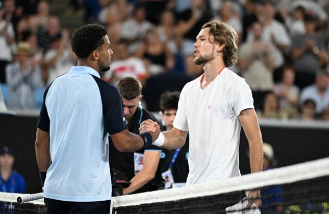 TENNIS AUSTRALIAN OPEN, Arthur Fils of France (left) shakes hands with Otto Virtanen of Finland after winning his first round match during the 2025 Australian Open at Melbourne Park in Melbourne, Sunday, January 12, 2025. ( NO ARCHIVING, EDITORIAL USE ONLY, NO USE IN BOOKS WITHOUT CONSENT MELBOURNE VICTORIA AUSTRALIA  Copyright: xJAMESxROSSx 20250112193532345299