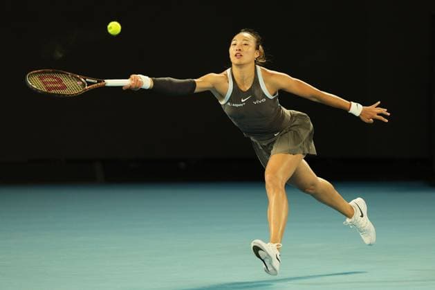 Qinwen Zheng of China hits a forehand during her first round match Australian Open, Day One, Tennis, Melbourne Park, Melbourne, Australia - 12 Jan 2025  Copyright: xRachelxBach Shutterstockx 15095111u