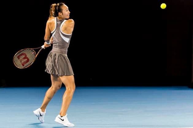 MELBOURNE, VIC - JANUARY 12: Qinwen Zheng of China in action during Round 1 of the 2025 Australian Open on January 12 2025, at Melbourne Park in Melbourne, Australia. (Photo by Jason Heidrich Icon Sportswire) TENNIS: JAN 12 Australian Open EDITORIAL USE ONLY Icon250112042