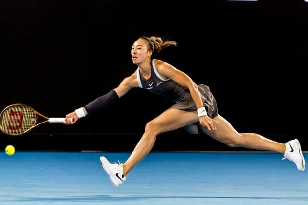 MELBOURNE, VIC - JANUARY 12: Qinwen Zheng of China in action during Round 1 of the 2025 Australian Open on January 12 2025, at Melbourne Park in Melbourne, Australia. (Photo by Jason Heidrich Icon Sportswire) TENNIS: JAN 12 Australian Open EDITORIAL USE ONLY Icon250112061