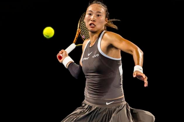 MELBOURNE, VIC - JANUARY 12: Qinwen Zheng of China in action during Round 1 of the 2025 Australian Open on January 12 2025, at Melbourne Park in Melbourne, Australia. (Photo by Jason Heidrich Icon Sportswire) TENNIS: JAN 12 Australian Open EDITORIAL USE ONLY Icon250112063
