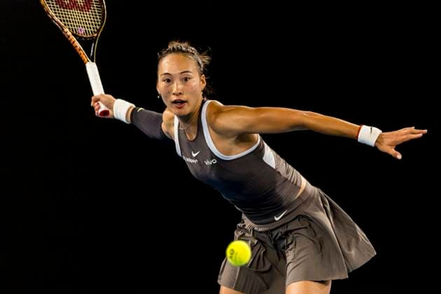 MELBOURNE, VIC - JANUARY 12: Qinwen Zheng of China in action during Round 1 of the 2025 Australian Open on January 12 2025, at Melbourne Park in Melbourne, Australia. (Photo by Jason Heidrich Icon Sportswire) TENNIS: JAN 12 Australian Open EDITORIAL USE ONLY Icon250112069