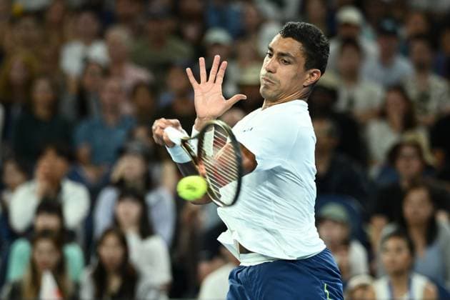 TENNIS AUSTRALIAN OPEN, Thiago Monteiro of Brazil returns during his round 1 match against Kei Nishikori of Japan during the 2025 Australian Open at Melbourne Park in Melbourne, Sunday, January 12, 2025. ( NO ARCHIVING, EDITORIAL USE ONLY, NO USE IN BOOKS WITHOUT CONSENT MELBOURNE VICTORIA AUSTRALIA  Copyright: xJOELxCARRETTx 20250112176085631360