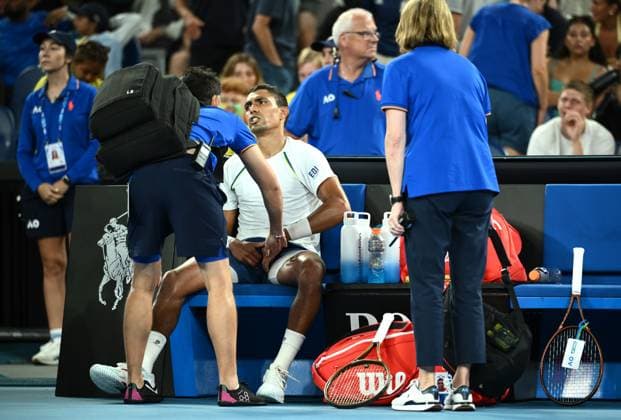 TENNIS AUSTRALIAN OPEN, Thiago Monteiro of Brazil receives medical assistance during his round 1 match against Kei Nishikori of Japan during the 2025 Australian Open at Melbourne Park in Melbourne, Sunday, January 12, 2025. ( NO ARCHIVING, EDITORIAL USE ONLY, NO USE IN BOOKS WITHOUT CONSENT MELBOURNE VICTORIA AUSTRALIA  Copyright: xJOELxCARRETTx 20250112170982707610
