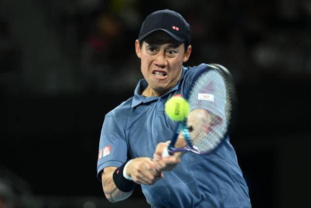 TENNIS AUSTRALIAN OPEN, Kei Nishikori of Japan returns during his round 1 match against Thiago Monteiro of Brazil during the 2025 Australian Open at Melbourne Park in Melbourne, Sunday, January 12, 2025. ( NO ARCHIVING, EDITORIAL USE ONLY, NO USE IN BOOKS WITHOUT CONSENT MELBOURNE VICTORIA AUSTRALIA  Copyright: xJOELxCARRETTx 20250112119226209201