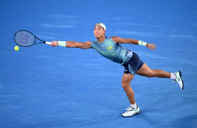 TENNIS AUSTRALIAN OPEN, Li Tu of Australia in action during his round 1 match against Jiri Lehecka of Czech Republic during the 2025 Australian Open at Melbourne Park in Melbourne, Sunday, January 12, 2025. ( NO ARCHIVING, EDITORIAL USE ONLY, NO USE IN BOOKS WITHOUT CONSENT MELBOURNE VICTORIA AUSTRALIA  Copyright: xJOELxCARRETTx 20250112166374737772