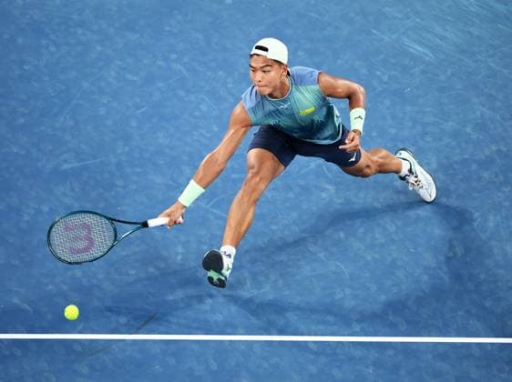 TENNIS AUSTRALIAN OPEN, Li Tu of Australia in action during his round 1 match against Jiri Lehecka of Czech Republic during the 2025 Australian Open at Melbourne Park in Melbourne, Sunday, January 12, 2025. ( NO ARCHIVING, EDITORIAL USE ONLY, NO USE IN BOOKS WITHOUT CONSENT MELBOURNE VICTORIA AUSTRALIA  Copyright: xJOELxCARRETTx 20250112111316032491