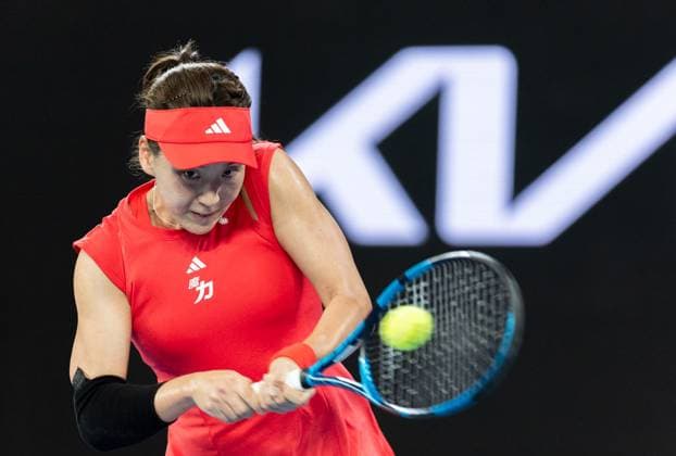 (250112) -- MELBOURNE, Jan. 12, 2025 -- Wang Xinyu hits a return during the women s singles 1st round match between Wang Xinyu of China and Paula Badosa of Spain at 2025 Australian Open tennis tournament in Melbourne, Australia, Jan. 12, 2025. (Photo by Xinhua) (SP)AUSTRALIA-MELBOURNE-TENNIS-AUSTRALIAN OPEN-DAY 1 HuxJingchen 