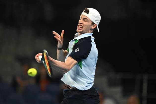 TENNIS AUSTRALIAN OPEN, Ugo Humbert of France returns during his round 1 match against Matteo Gigante of Italy during the 2025 Australian Open at Melbourne Park in Melbourne, Sunday, January 12, 2025. ( NO ARCHIVING, EDITORIAL USE ONLY, NO USE IN BOOKS WITHOUT CONSENT MELBOURNE VICTORIA AUSTRALIA  Copyright: xLUKASxCOCHx 20250112145566157015