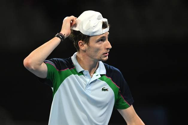 TENNIS AUSTRALIAN OPEN, Ugo Humbert of France looks on during his round 1 match against Matteo Gigante of Italy during the 2025 Australian Open at Melbourne Park in Melbourne, Sunday, January 12, 2025. ( NO ARCHIVING, EDITORIAL USE ONLY, NO USE IN BOOKS WITHOUT CONSENT MELBOURNE VICTORIA AUSTRALIA  Copyright: xLUKASxCOCHx 20250112165754546520