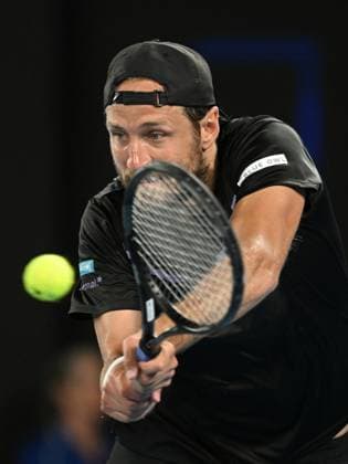 TENNIS AUSTRALIAN OPEN, Lucas Pouille of France returns during his round 1 match against Alexander Zverev of Germany during the 2025 Australian Open at Melbourne Park in Melbourne, Sunday, January 12, 2025. ( NO ARCHIVING, EDITORIAL USE ONLY, NO USE IN BOOKS WITHOUT CONSENT MELBOURNE VICTORIA AUSTRALIA  Copyright: xLUKASxCOCHx 20250112147211783208